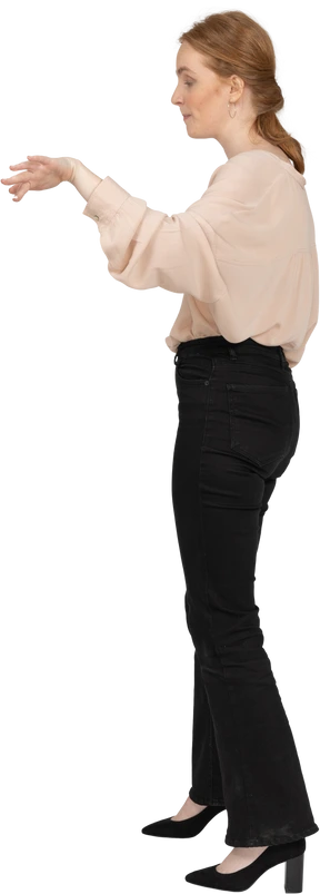Woman in beautiful blouse standing