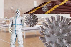 A man in a protective suit standing in a room