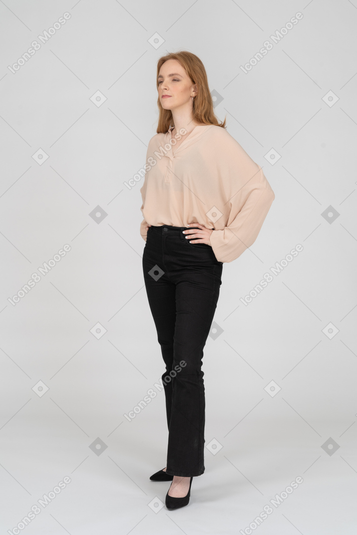 Woman in beautiful blouse standing