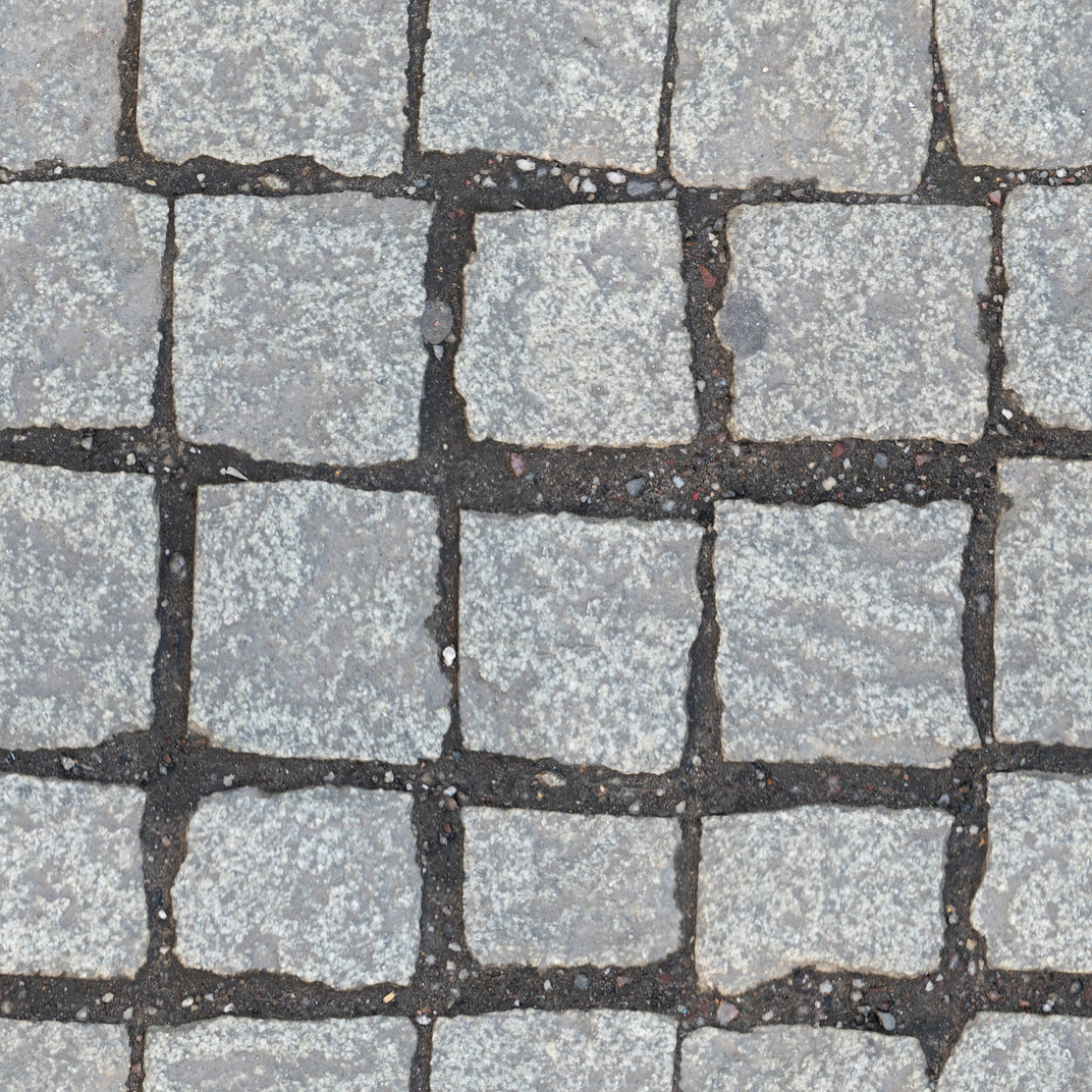Ground between pavement blocks