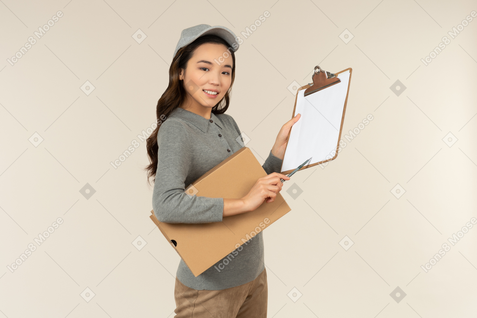 Young asian delivery girl carrying box and folder