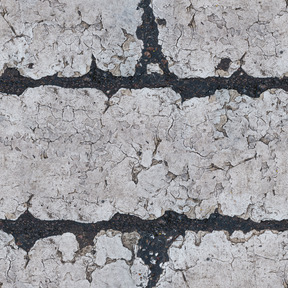 Wide white stripes drawn on asphalt