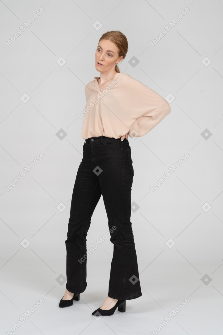 Woman in beautiful blouse standing