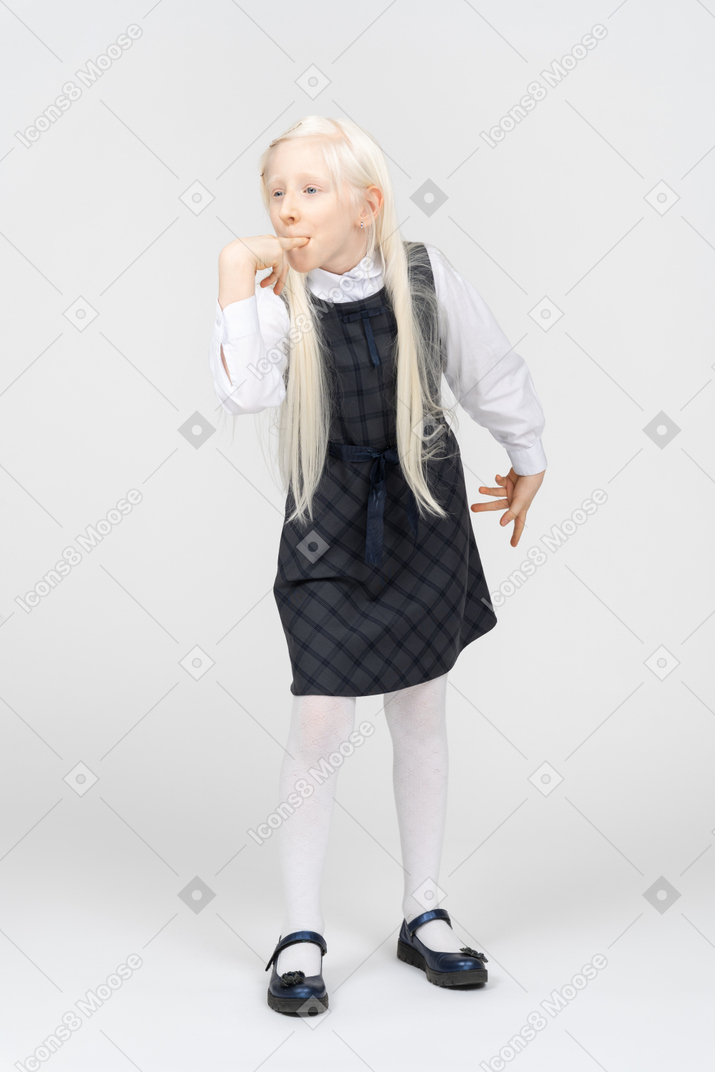 Schoolgirl whistling with her fingers