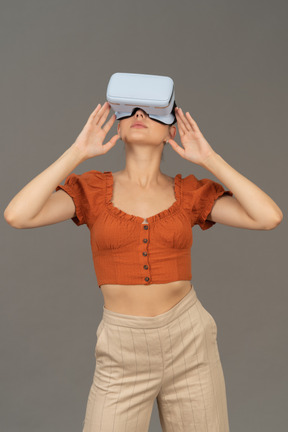 Front view of young woman in vr headset