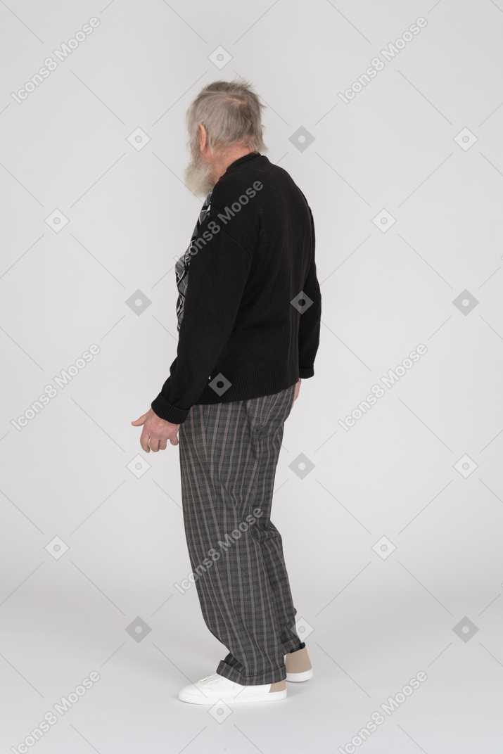 Back view of an old man standing