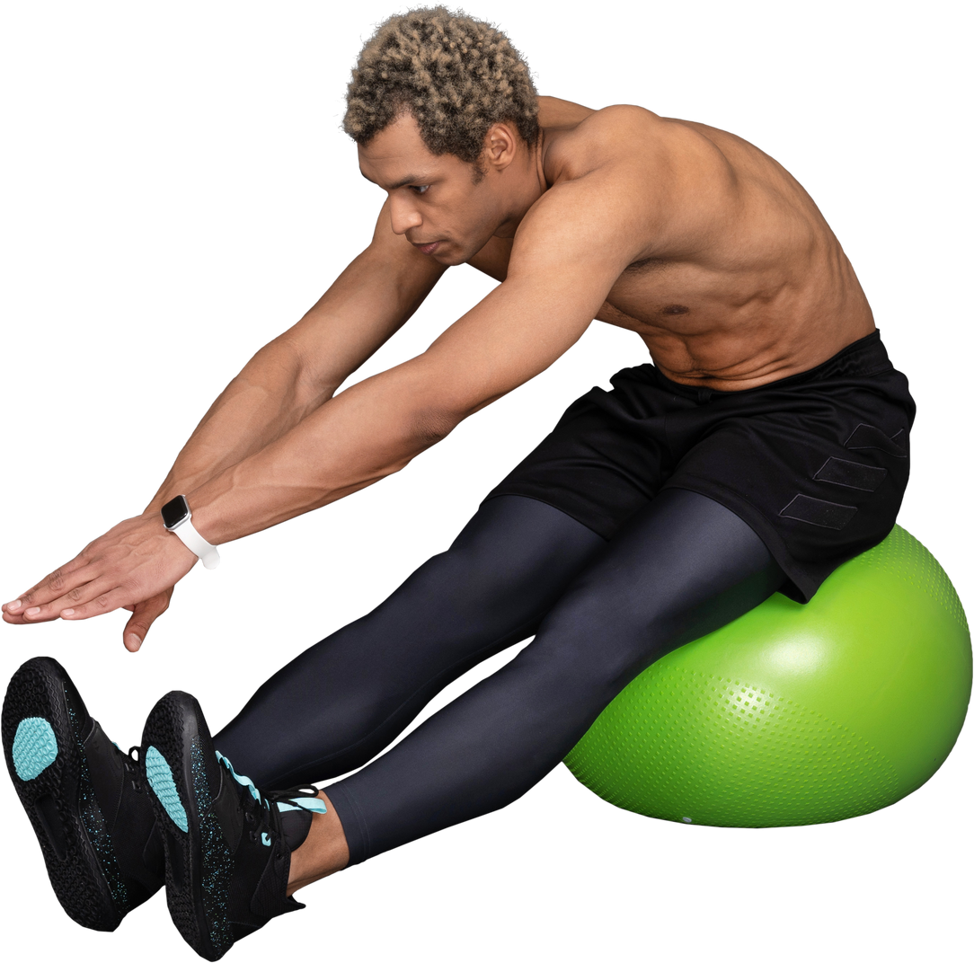 Threequarter view of a shirtless afro man stretching while sitting on