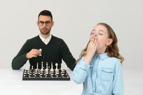 Dad, chess is a boring game