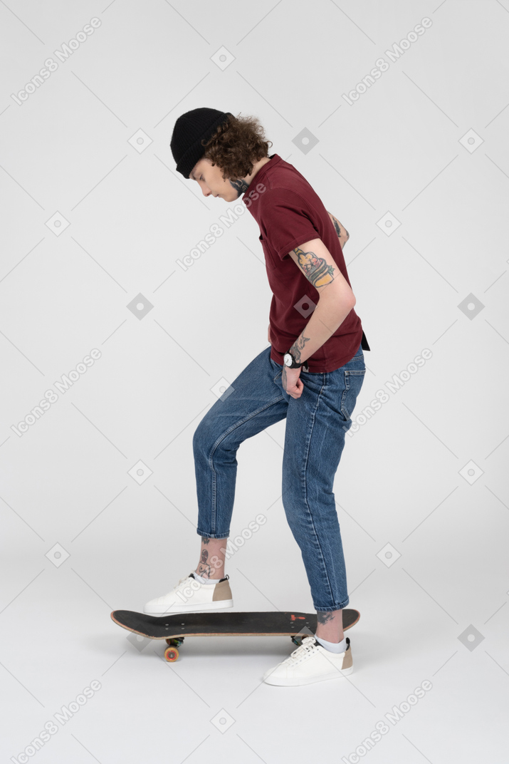 A skateboarding teenager