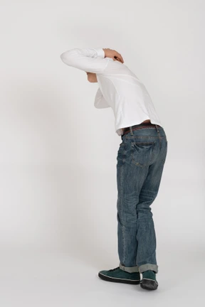 Young man in casual clothes standing