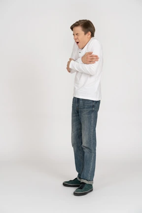 Young man in casual clothes standing
