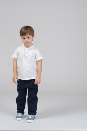 Front view of little boy standing