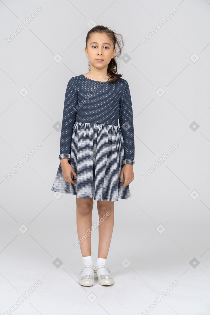 Full length of a girl in casual clothes standing