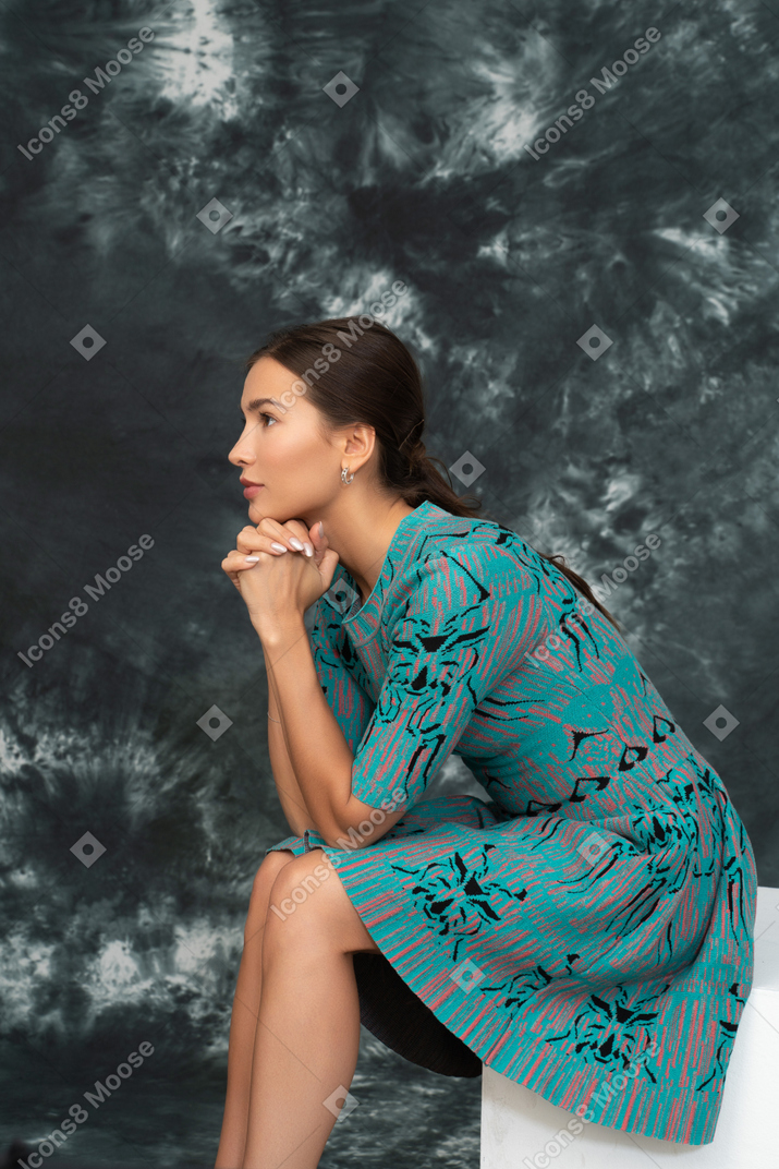 Portrait of a thoughtful lady in blue