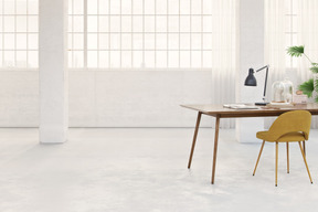 A white table and chairs in a living room