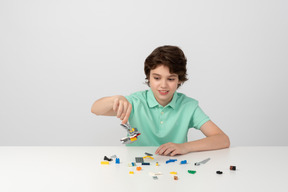 Boy playing with construction set