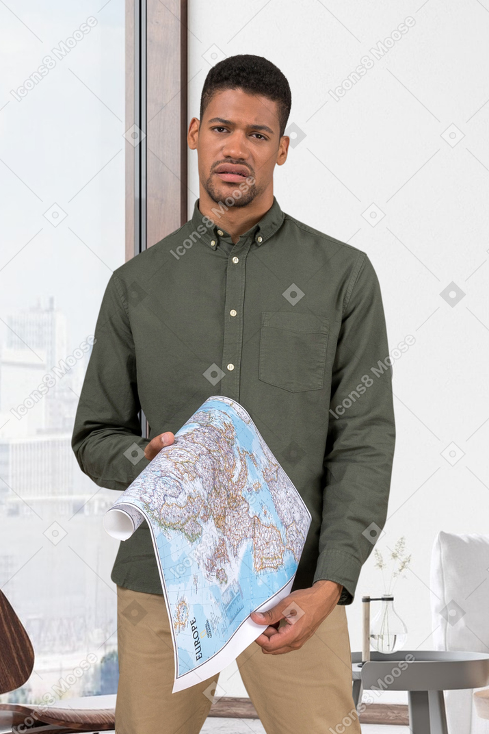 A man holding a map in his hands