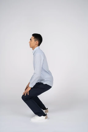 Man in casual clothes posing