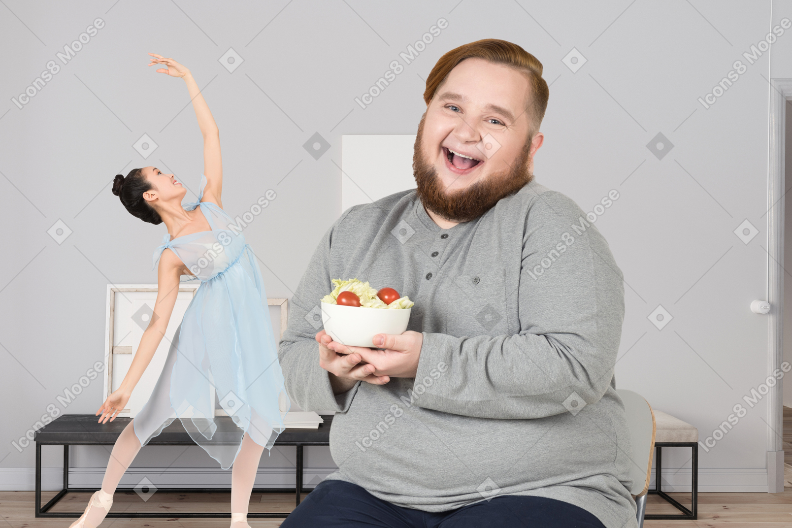 A man with a bowl of salad next to a woman dancing