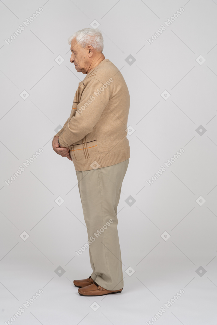 elderly man standing profile