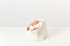 Linen bag with chicken eggs