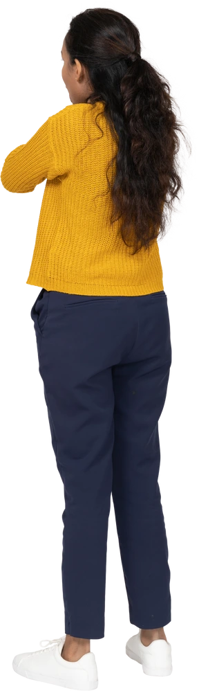 Rear view of a girl in casual clothes chocking herself