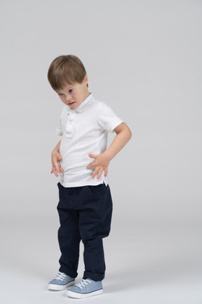 Little boy standing and gesturing