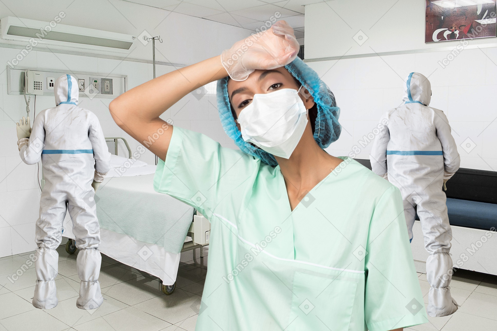 A woman wearing a surgical mask in a hospital