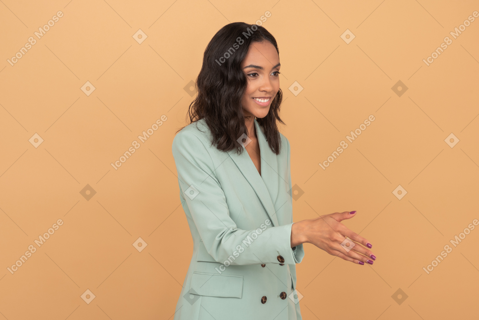 Attractive young woman with nice smile stretching hand for greetings