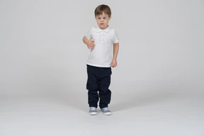 Front view of confused-looking little boy