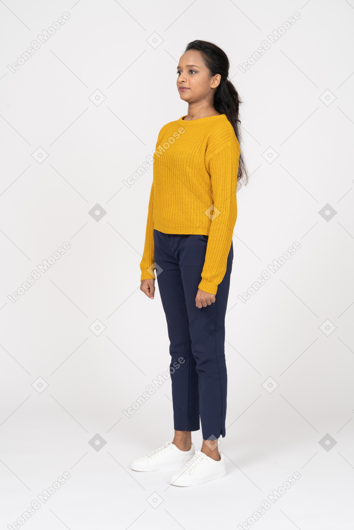 Side view of a surprised girl in casual clothes