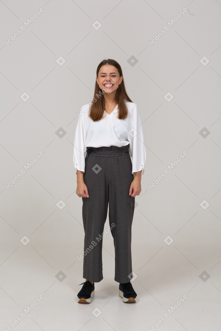 Front view of a young lady in office clothing smiling