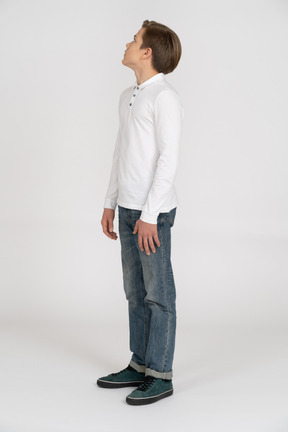 Young man in casual clothes standing