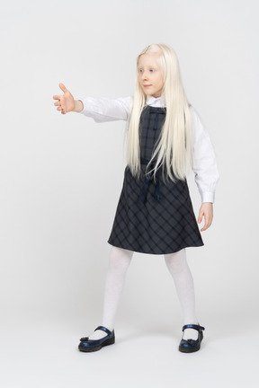 Schoolgirl offering a handshake