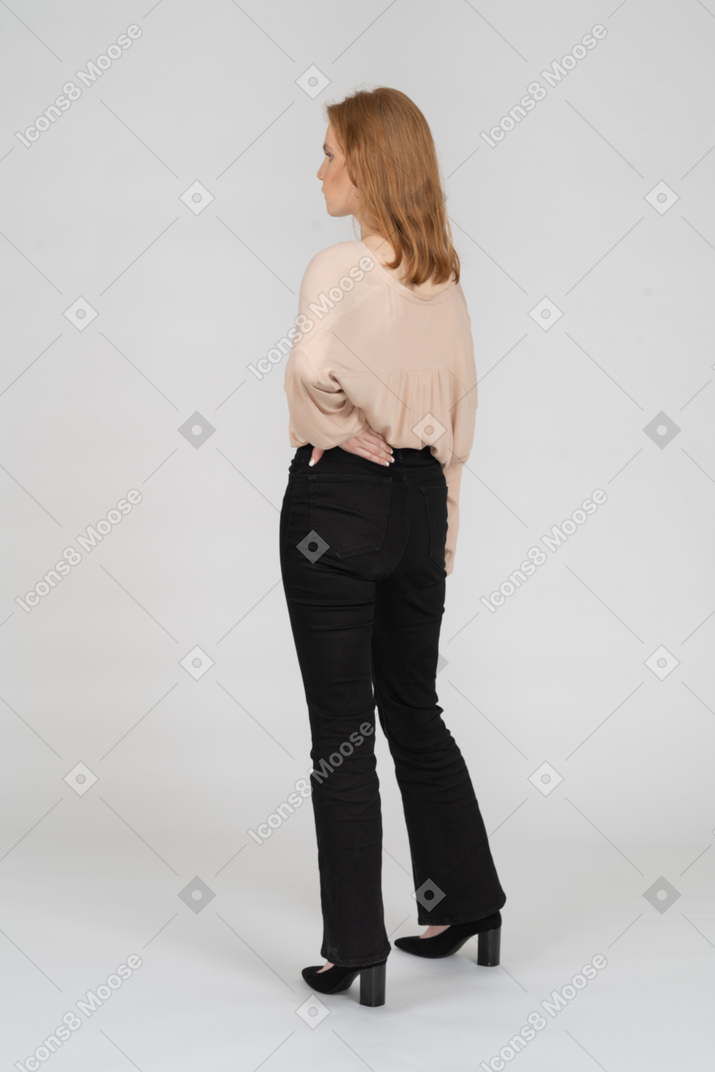 Woman in beautiful blouse standing