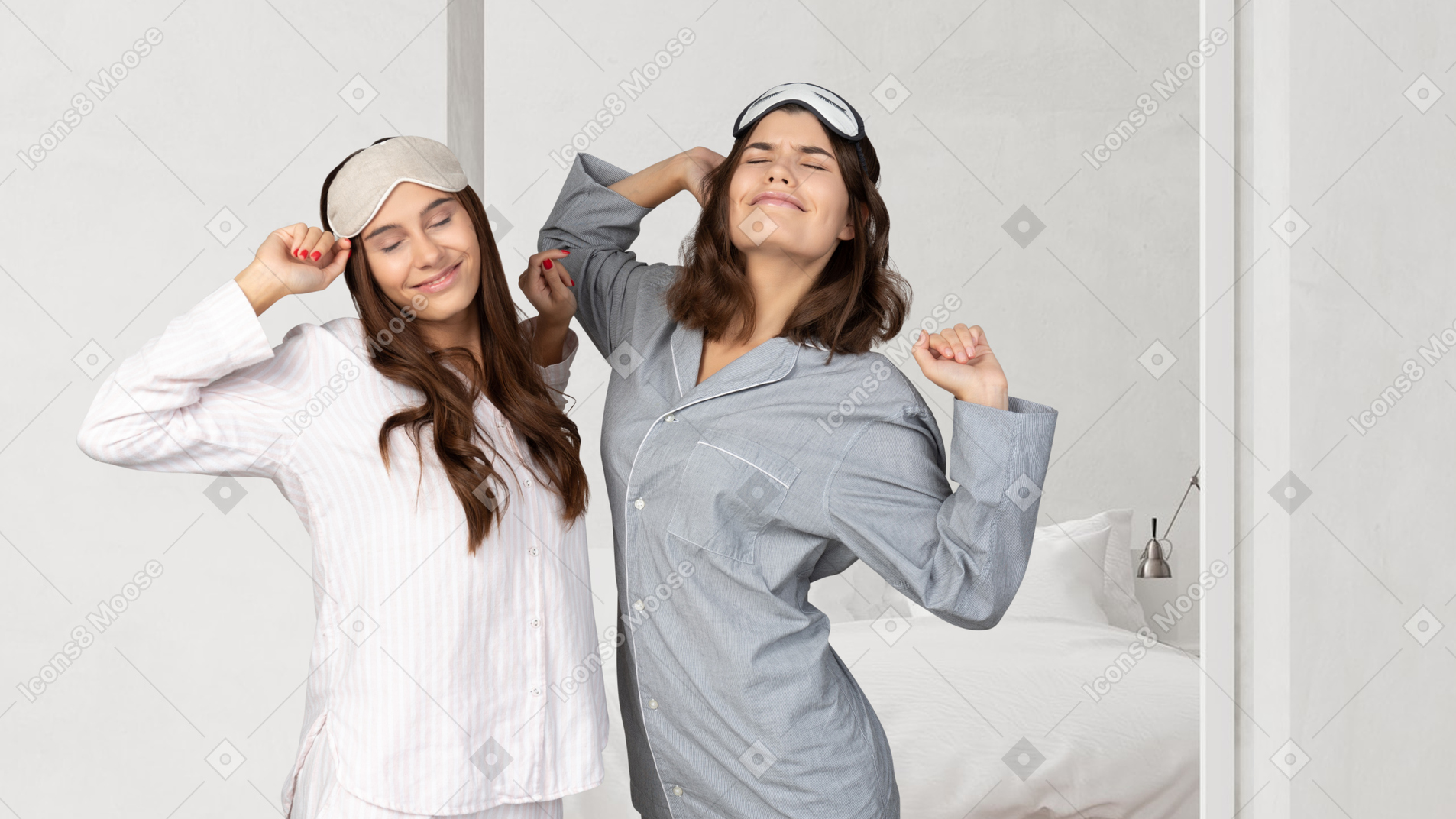 Two women in pyjamas waking up