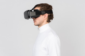 Side view of man in virtual reality headset