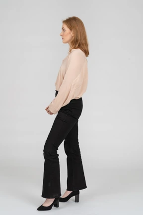 Woman in beautiful blouse standing