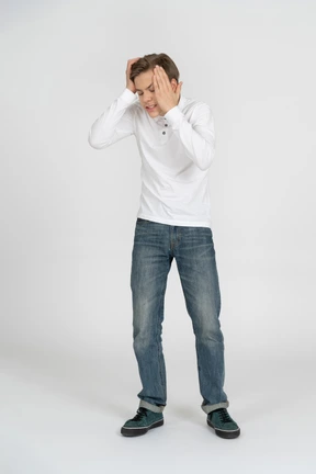 Young man in casual clothes standing