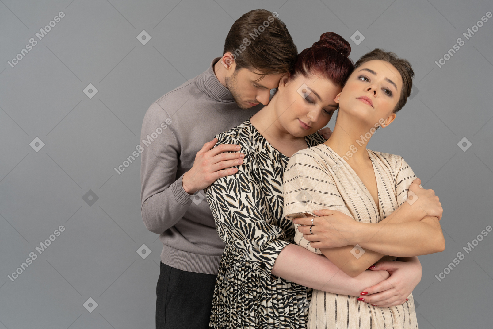 Warm embraces from two young women and one young man