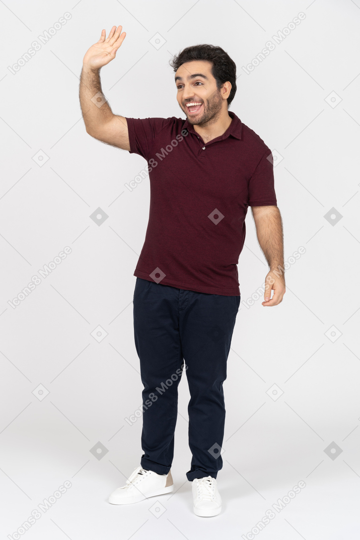 Cheerful man waving hello