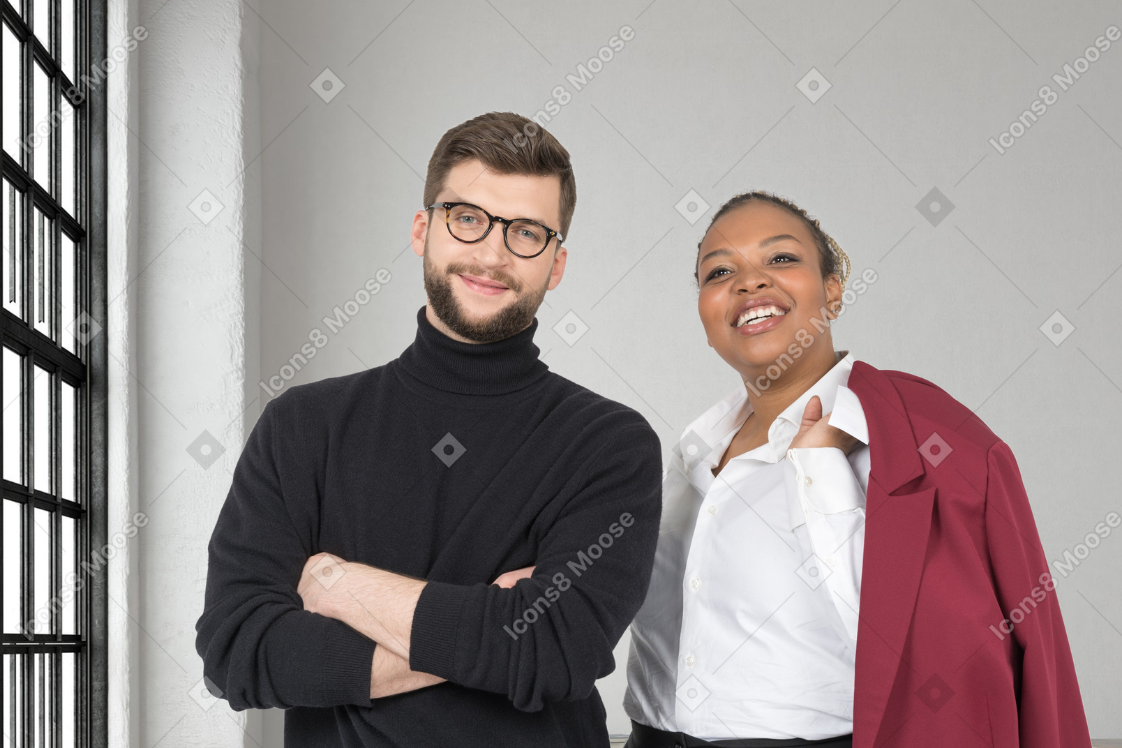 A man and a woman standing next to each other