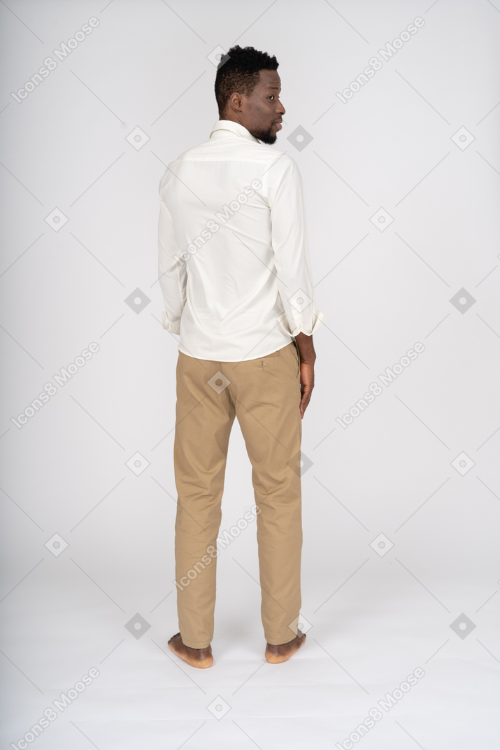 Man in white shirt standing