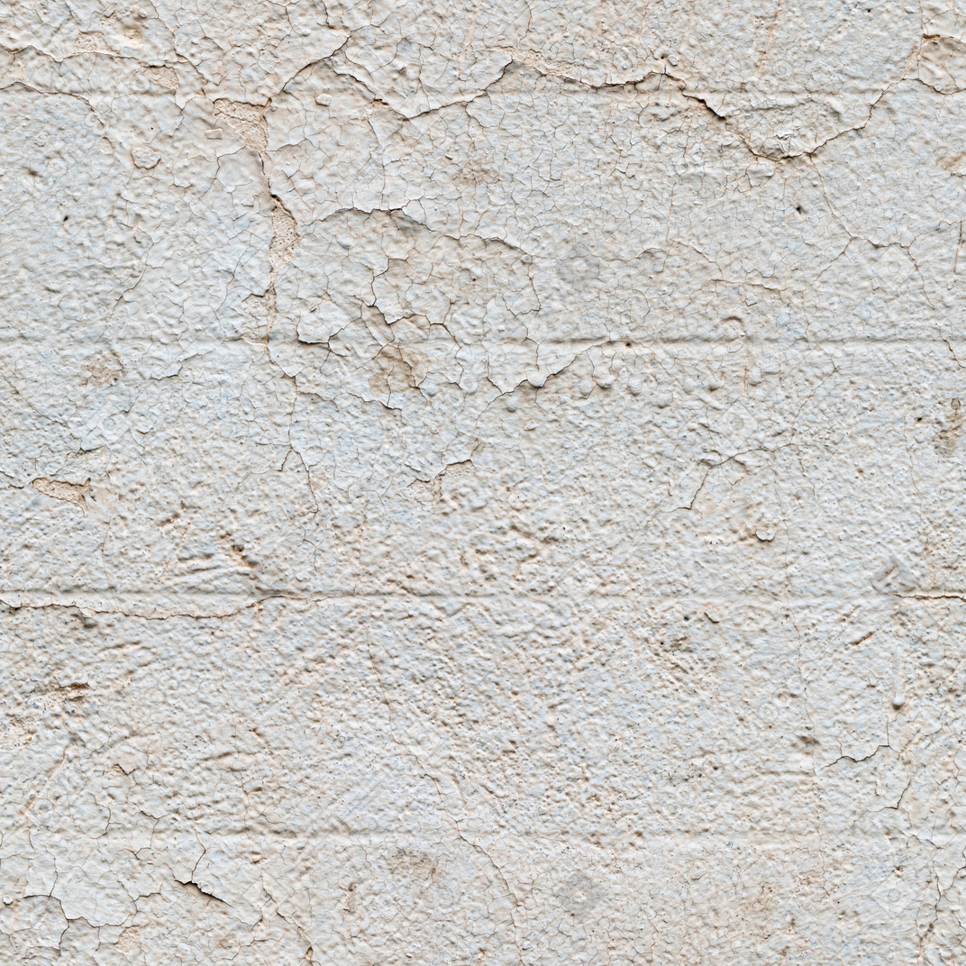 Vecchio strato di vernice incrinato sul muro di cemento