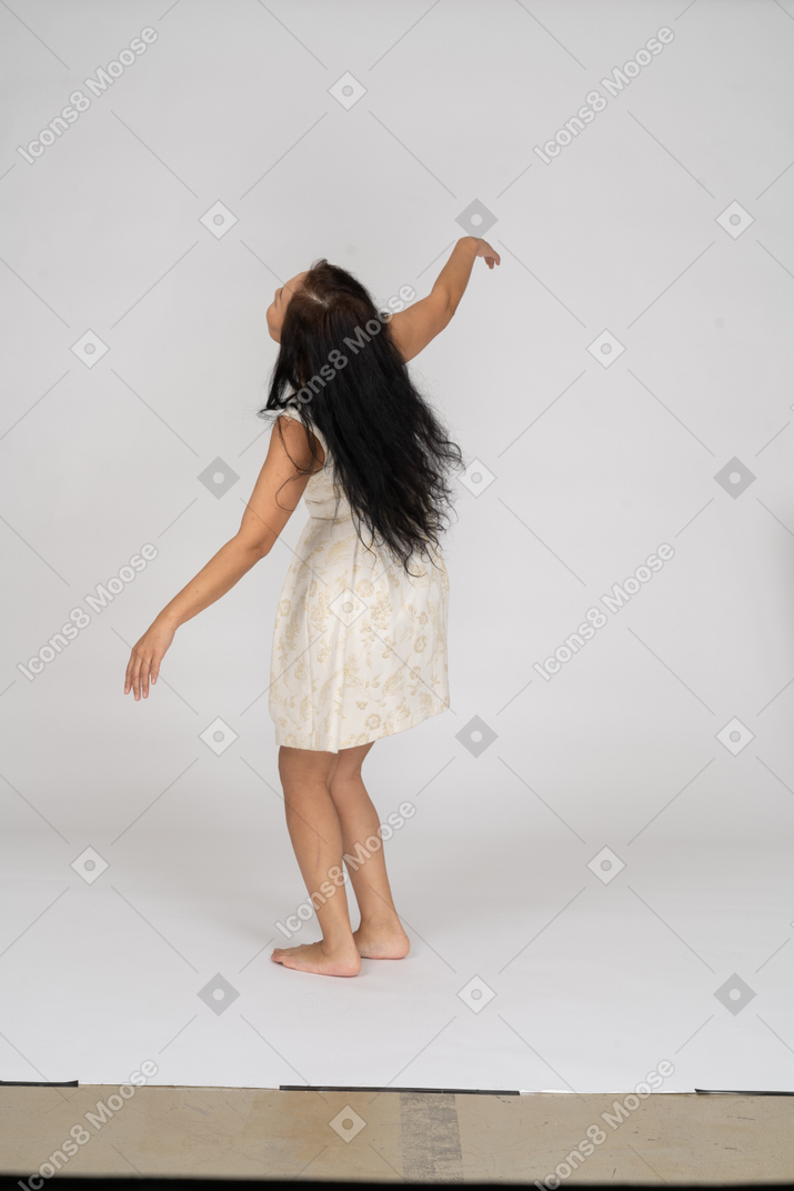 Woman in beautiful dress dancing