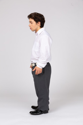 Side view of young man standing
