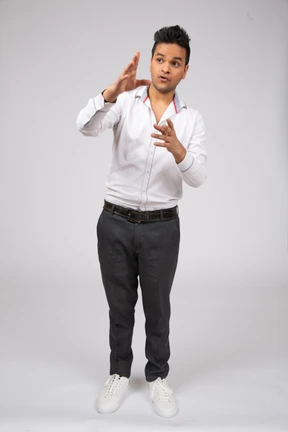 Man in white shirt standing