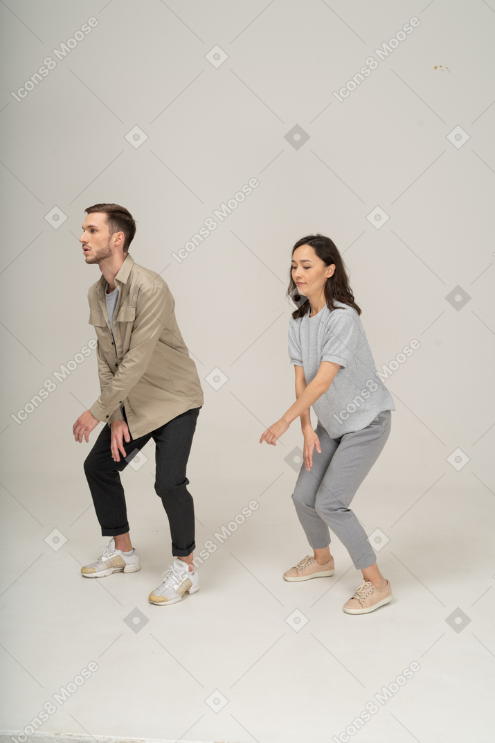 Man and woman dancing next to each other