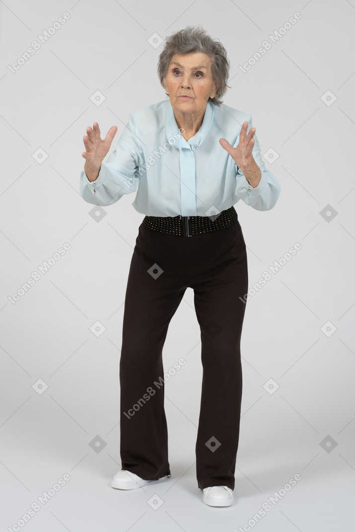 Old woman outstretching her hands