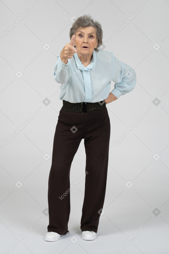 Old lady pointing